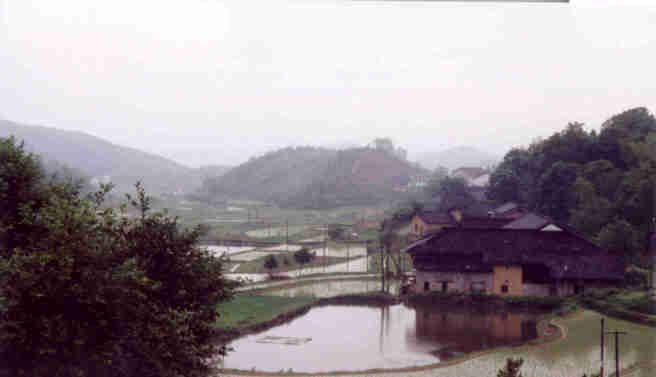 A farm with paddy fields  in Hunan Province on south western China
